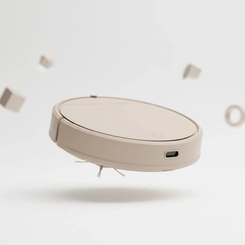 Modern robot vacuum cleaning a living room floor